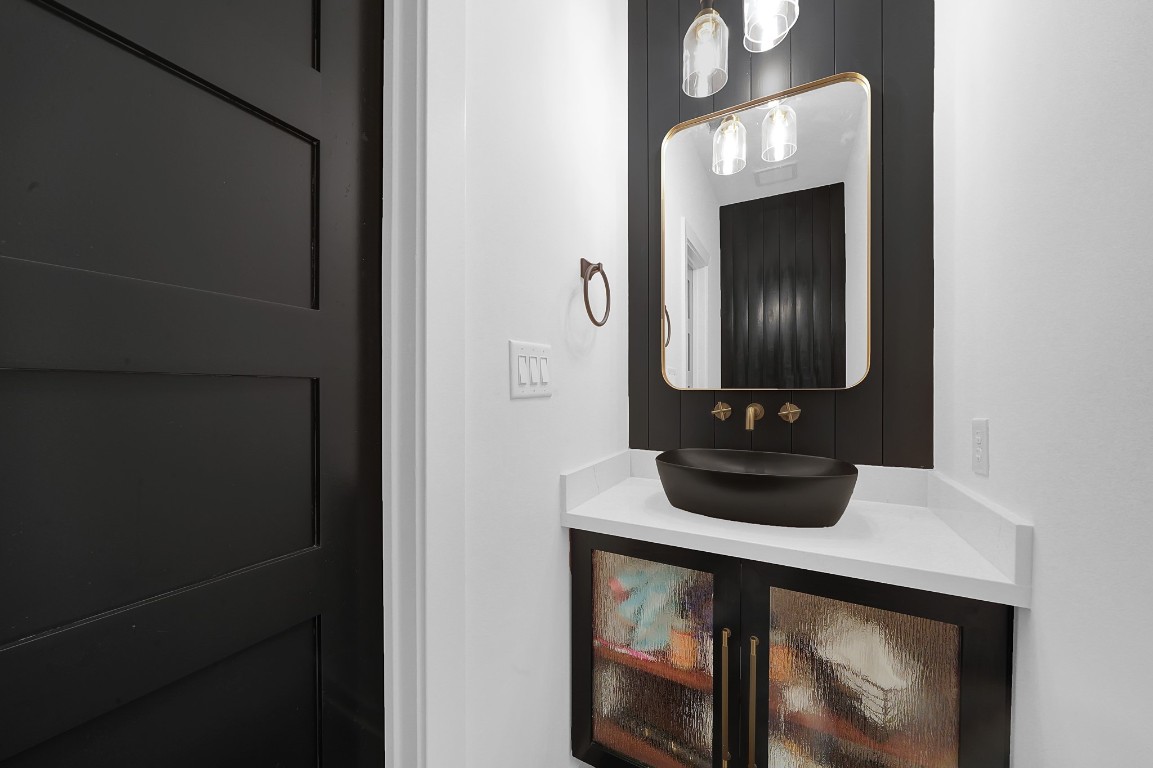 4730 Pitts Road Katy, TX 77493 - Photo 20 of 40 Newly updated chic half bath with modern fixtures, upgrade commode and bold accents.