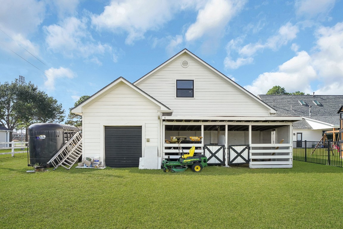 4730 Pitts Road Katy, TX 77493 - Photo 36 of 40 Barn Stall and Golf cart garage/Tractor.