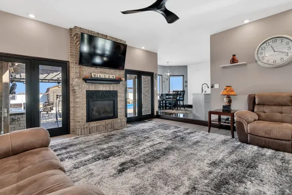 a kitchen with stainless steel appliances a stove a microwave and a refrigerator