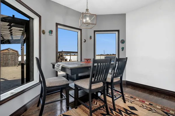 a view of a dining room with furniture