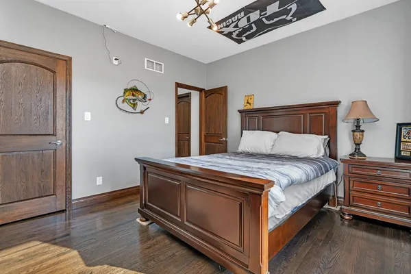 a room with a washing machine and mirror