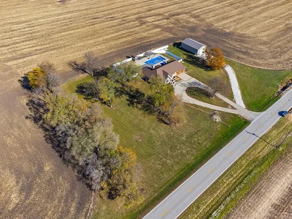 a view of swimming pool with a backyard