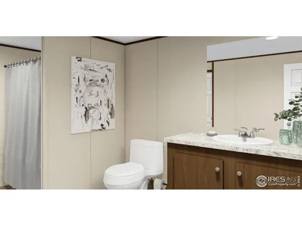 a bathroom with a sink double vanity and a mirror