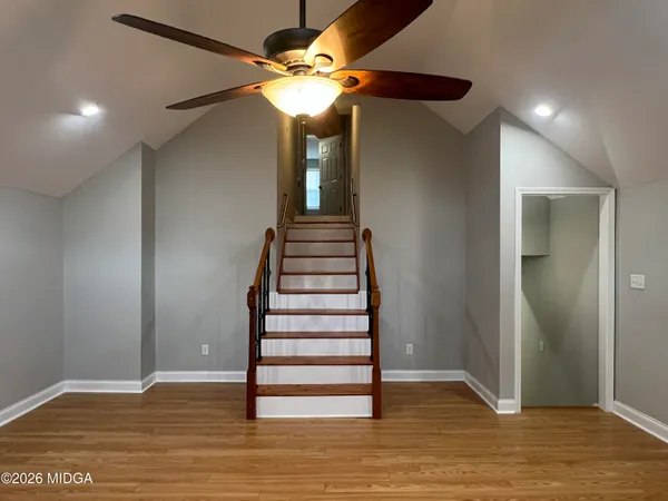 a view of entryway with wooden floor