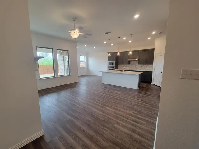a view of a kitchen and a sink