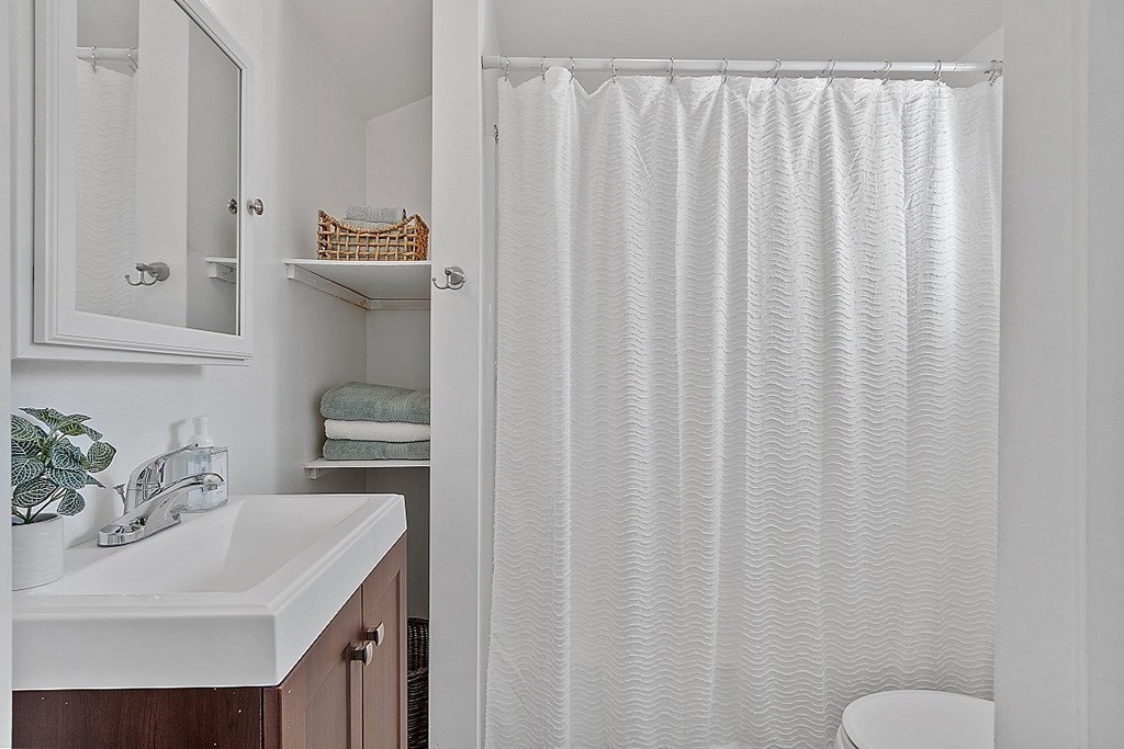 20 Fern Lane Manchester, NH 03109 - Photo 3 of 34 a bathroom with a sink toilet and