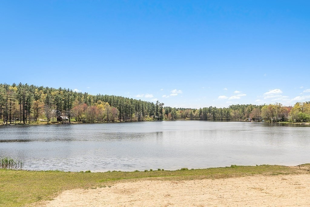 20 Fern Lane Manchester, NH 03109 - Photo 33 of 34 a view of a lake with houses in the background