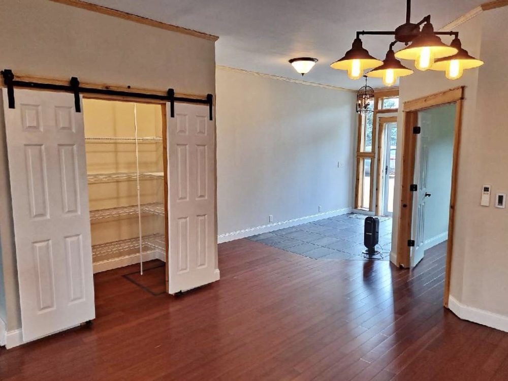24761 Genesee Road Sterling, IL 61081 - Photo 10 of 21 a view of entryway with wooden floor