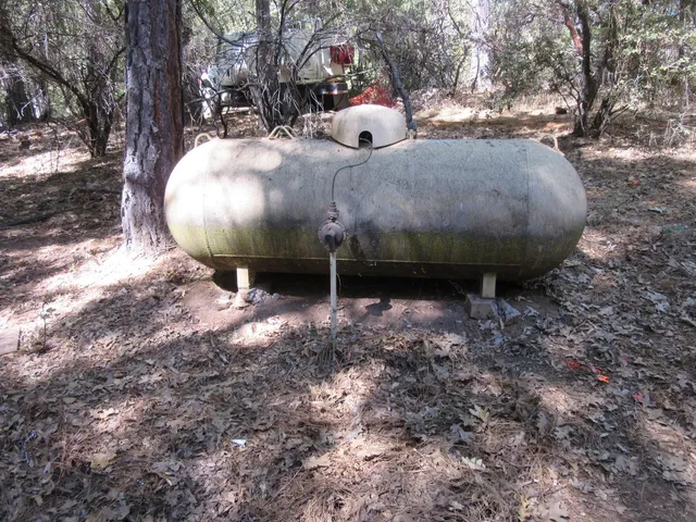 a view of a backyard of the house