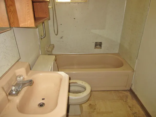 a bathroom with a sink and a toilet