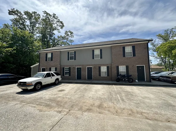 a view of a car in front of house