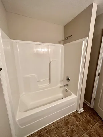 a bathroom with a sink vanity and a mirror