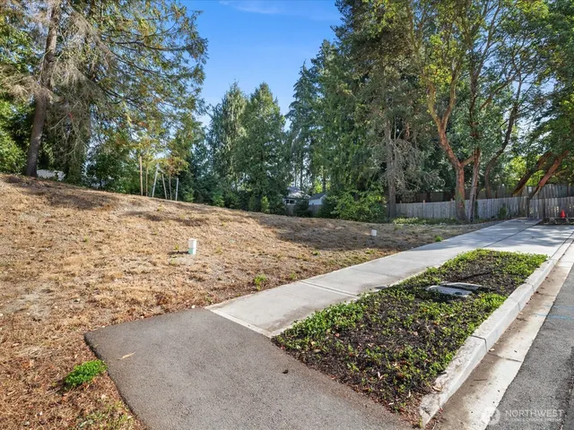 a view of a backyard of the house