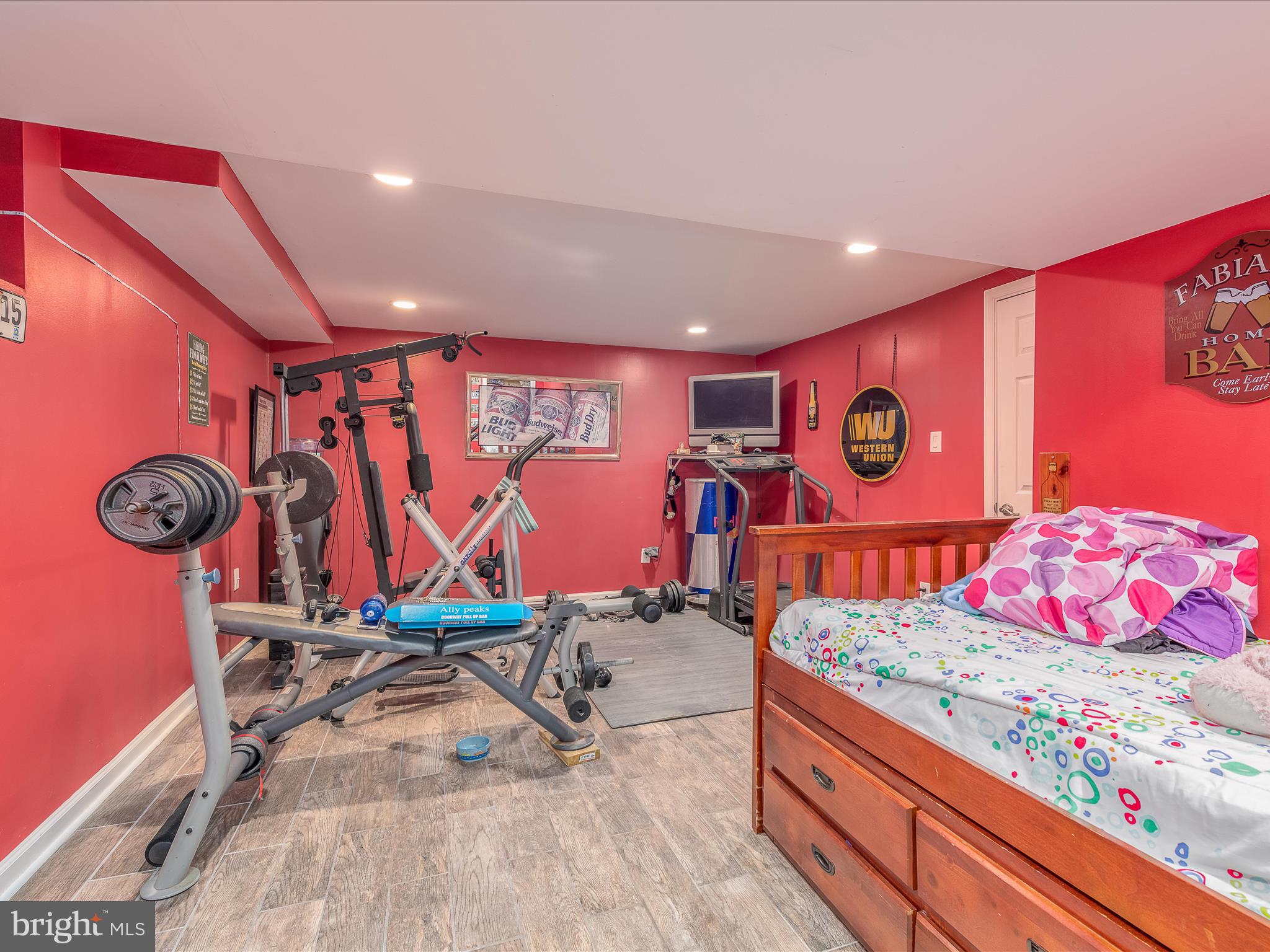 125 Deerfield Place Frederick, MD 21702 - Photo 19 of 34 Lower level rec room/ bedroom 4 features ceramic
