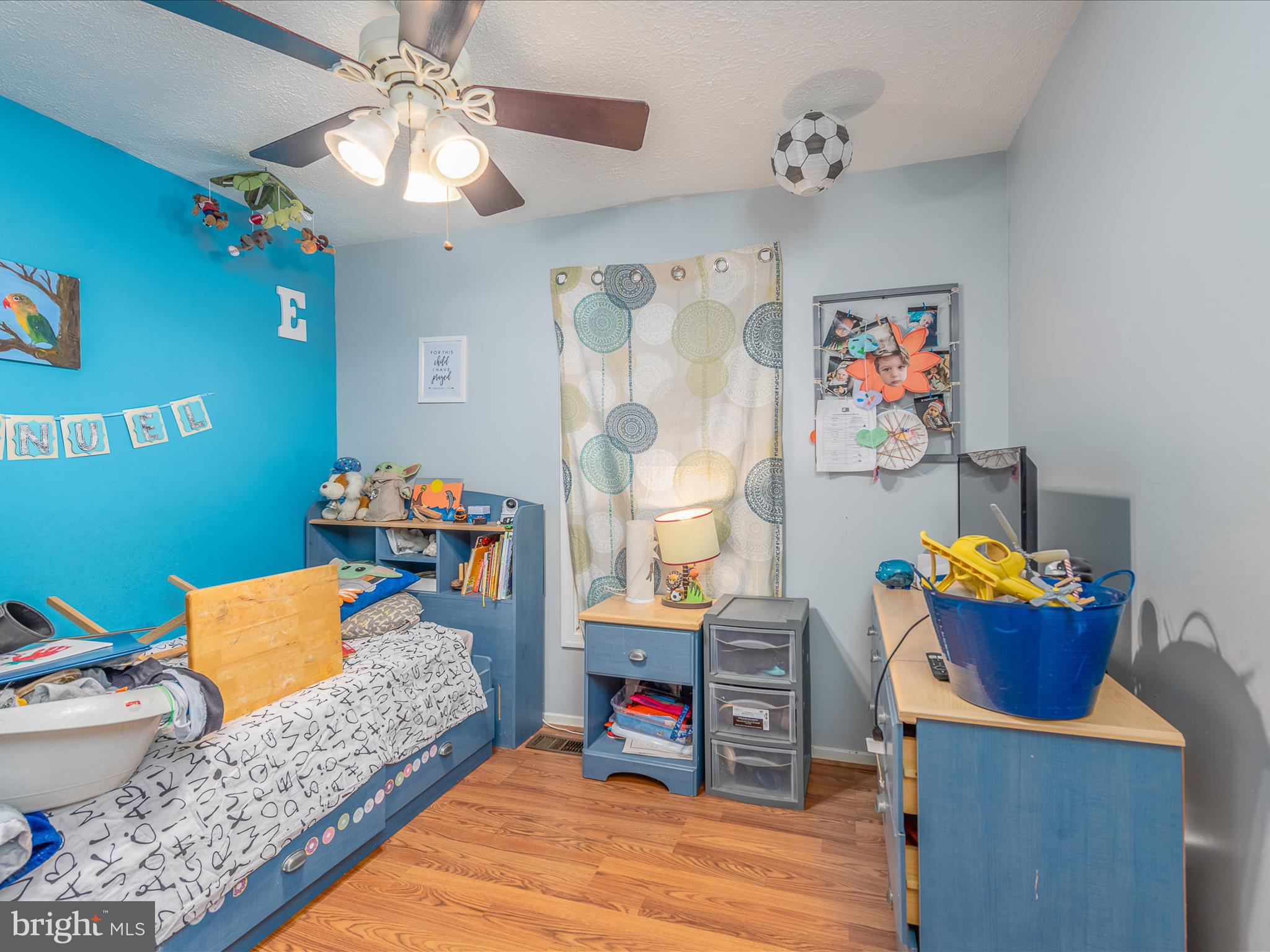 125 Deerfield Place Frederick, MD 21702 - Photo 10 of 34 Bedroom 1 w/ laminate floors and bright window