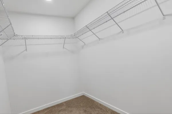 a view of a room with racks on the wall