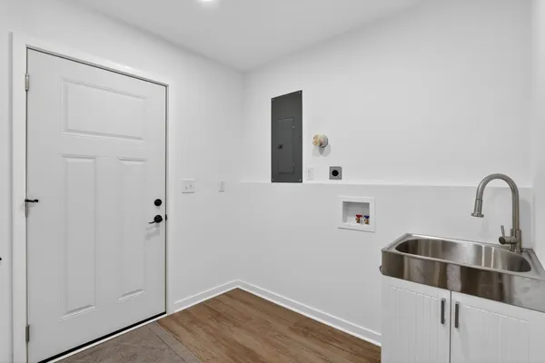 a view of a kitchen from the hallway