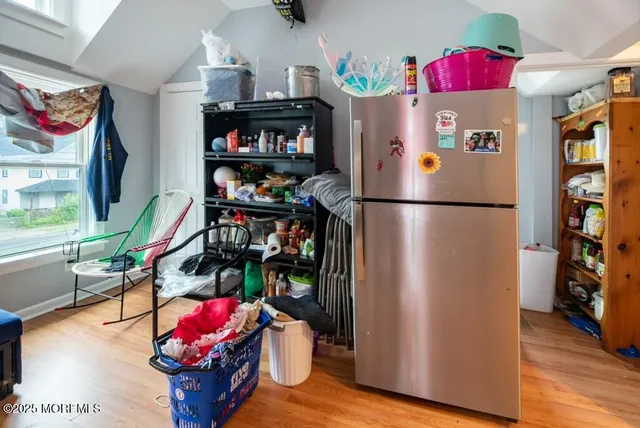 a white refrigerator freezer sitting inside of a kitchen