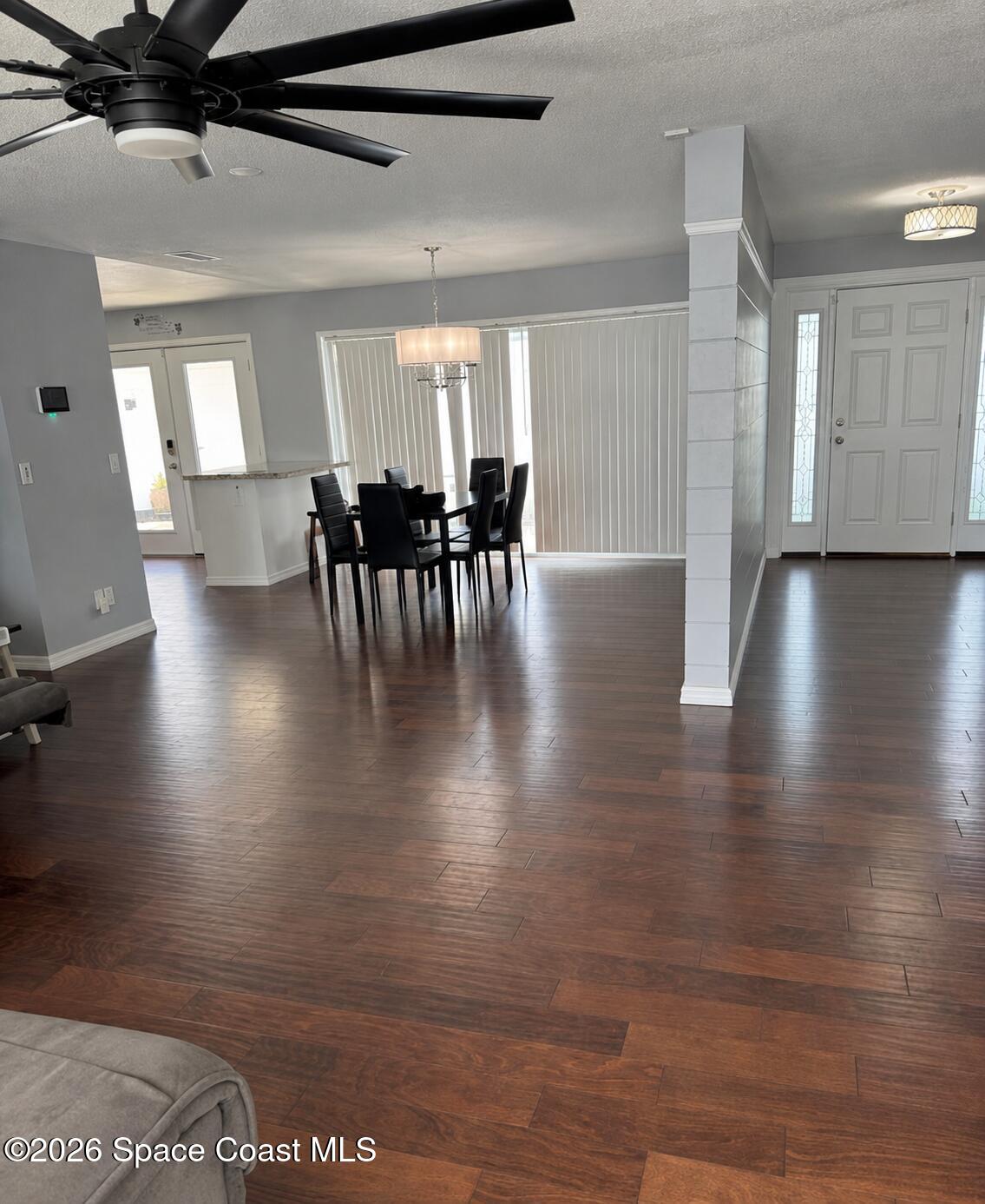 938 Brunswick Lane Rockledge, FL 32955 - Photo 13 of 21 View of kitch., DR, and entry from LR