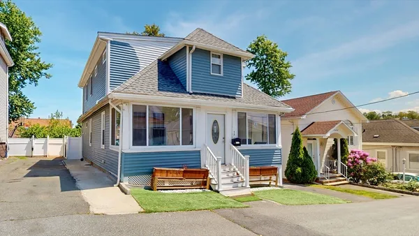 a front view of house with garage