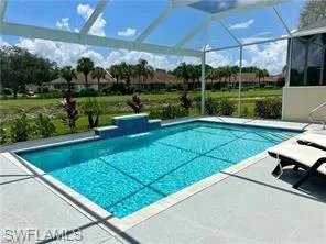 a view of a backyard with sitting area