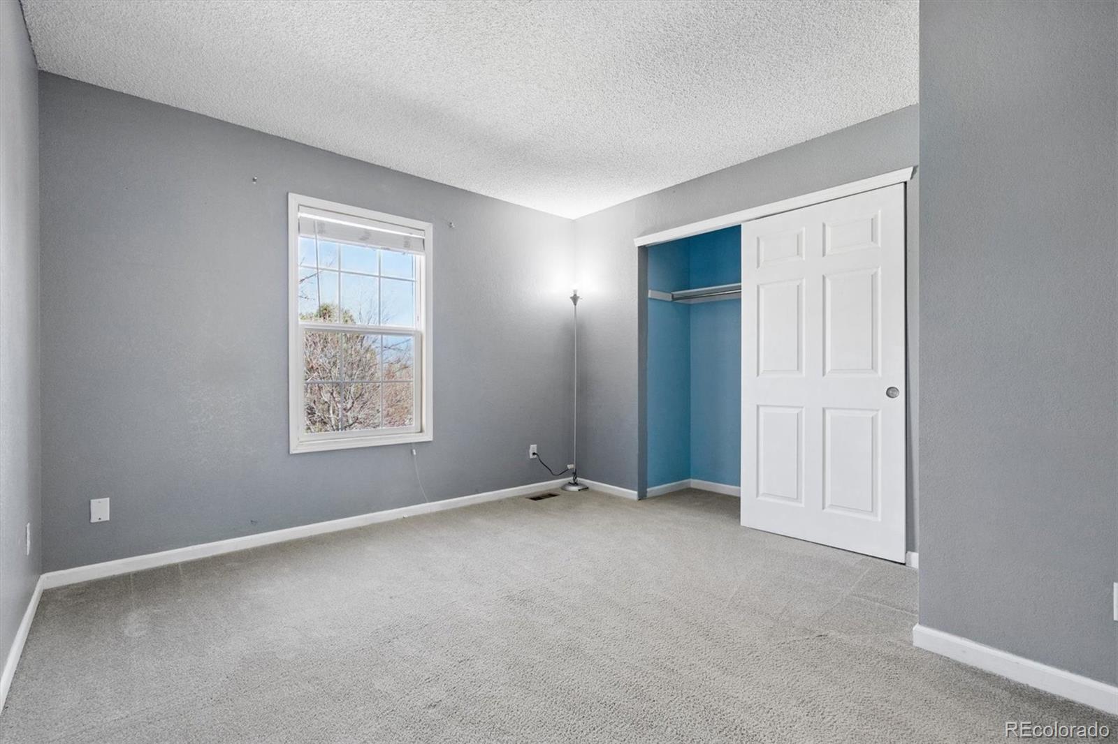 8139 South Fillmore Way Centennial, CO 80122 - Photo 14 of 29 an empty room with windows
