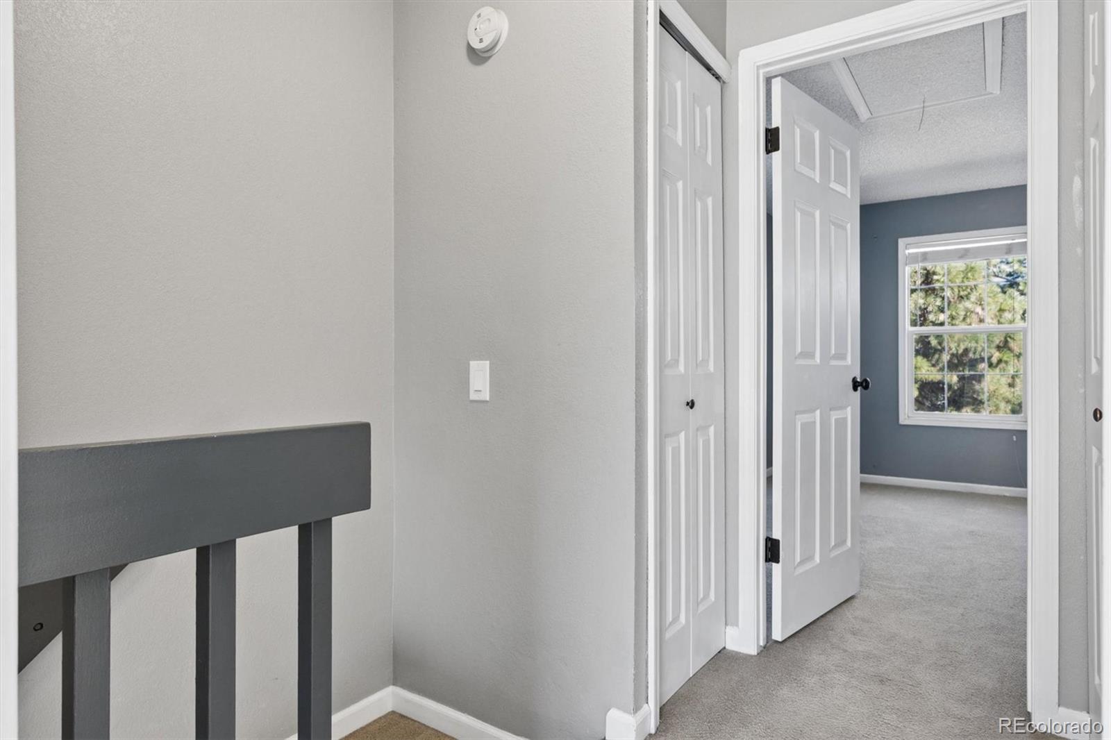 8139 South Fillmore Way Centennial, CO 80122 - Photo 16 of 29 a view of a hallway