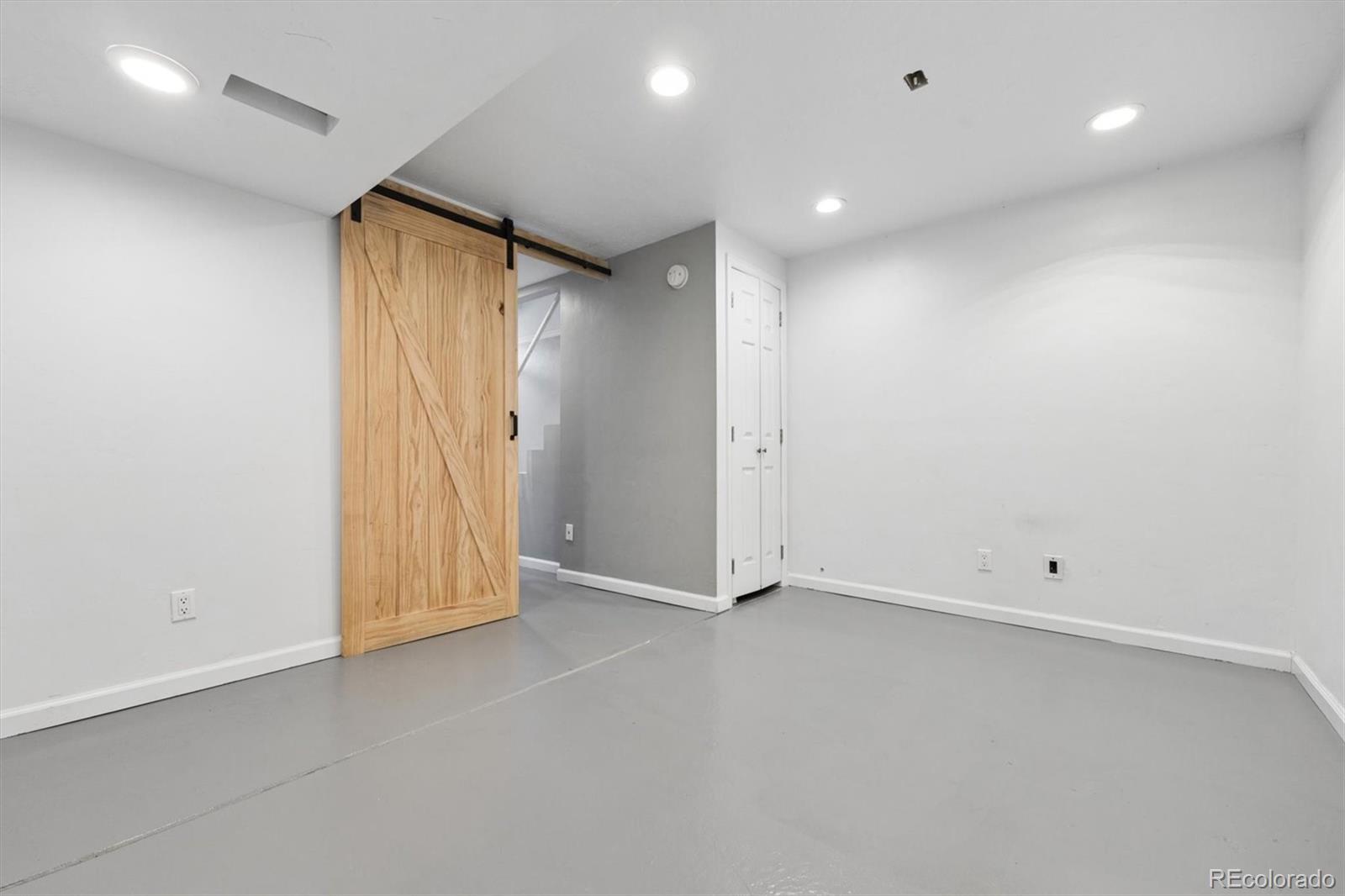 8139 South Fillmore Way Centennial, CO 80122 - Photo 22 of 29 an empty room with a empty space and a window
