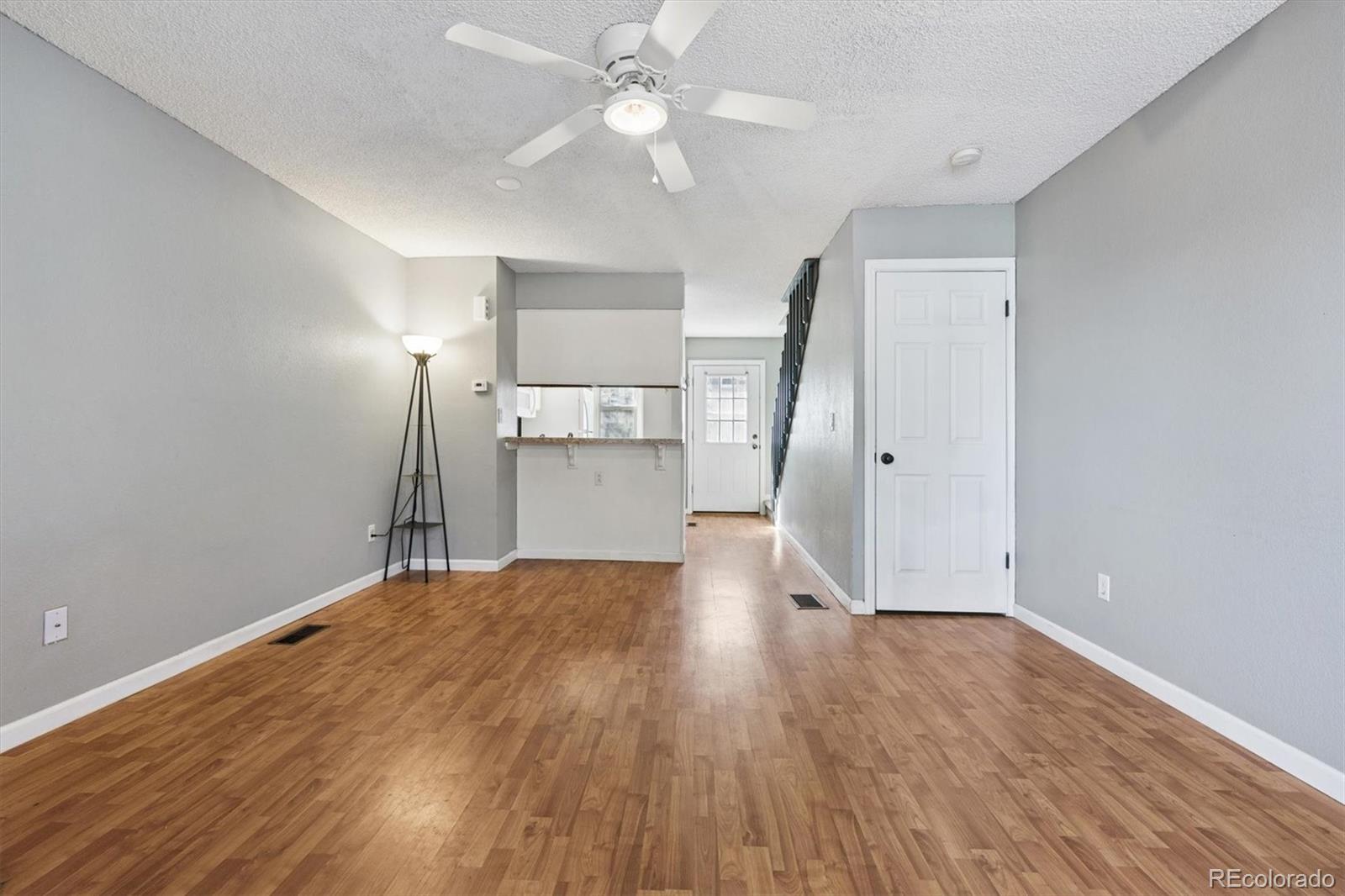 8139 South Fillmore Way Centennial, CO 80122 - Photo 8 of 29 a view of empty room with wooden floor