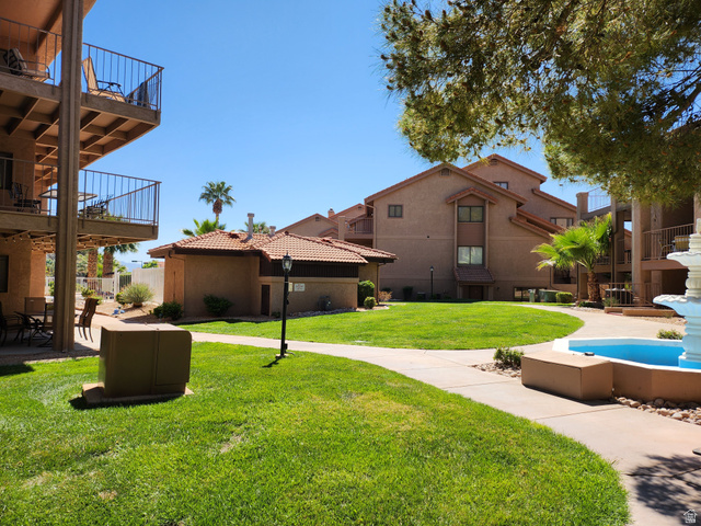 860 South Village Road, Unit Z10 St. George, UT 84770 - Photo 16 of 18 View of community with a patio and a balcony