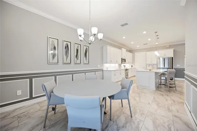 a bedroom with a bed and a mirror