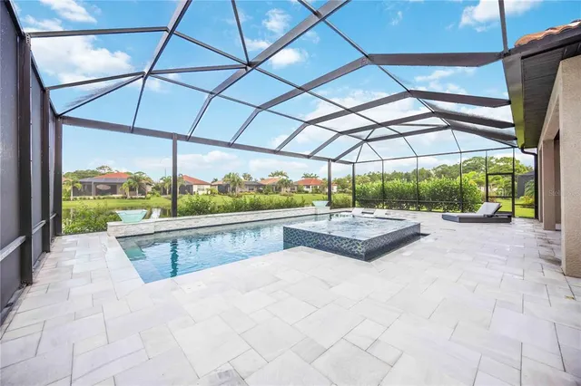 a aerial view of a house with a yard
