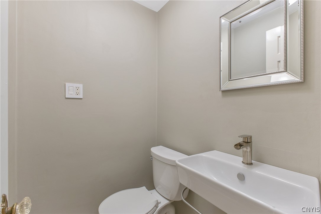 31 Lyndon Road Fayetteville, NY 13066 - Photo 20 of 47 Updated half bath off the living room hallway.