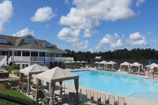 a view of a lake with a yard