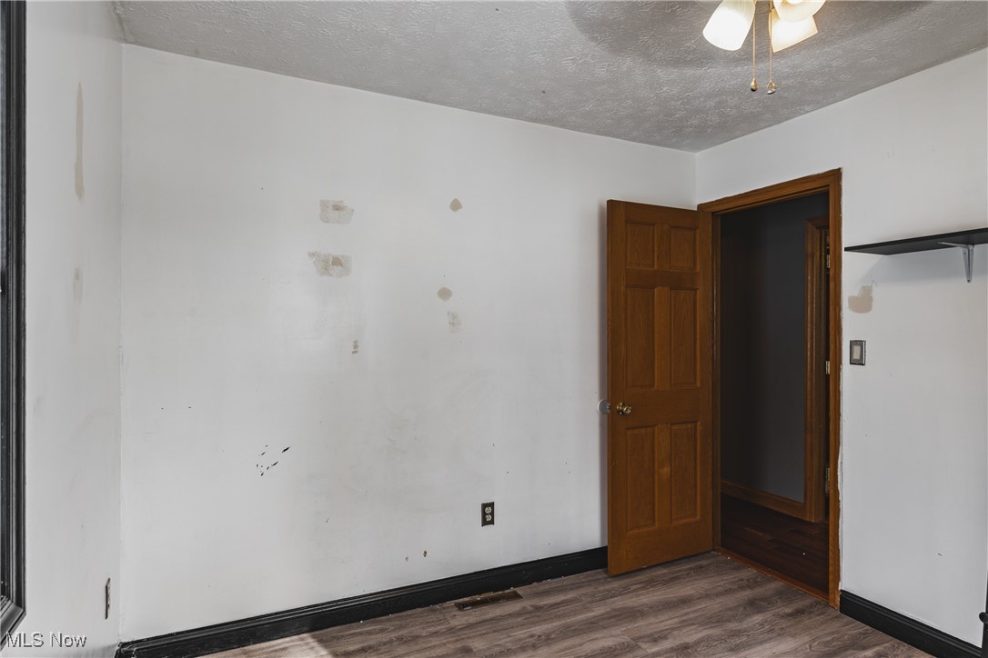 111 River Hill Road Washington, WV 26181 - Photo 13 of 29 The flooring is LVT.