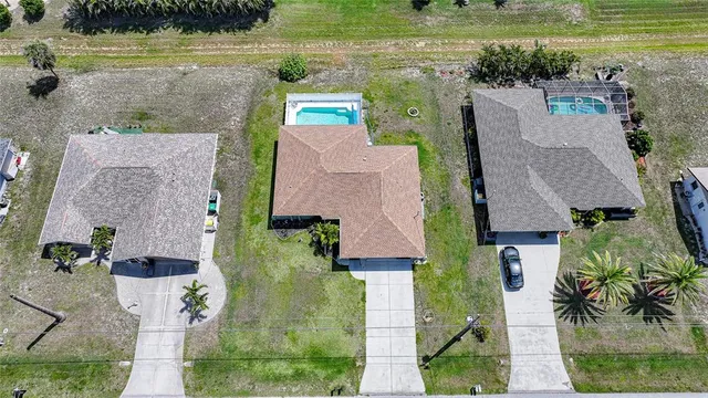 a view of a river and a yard in the back