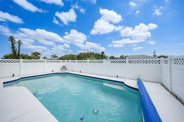 a view of a room with a large window