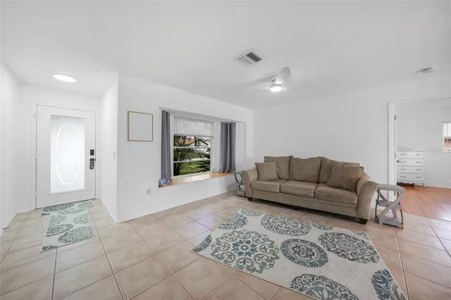 a living room with furniture and a couch