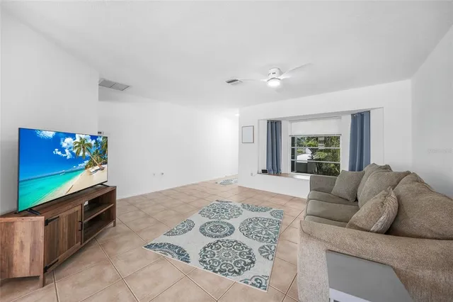 a living room with furniture and a couch