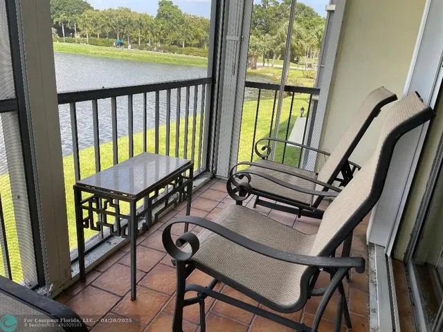 a balcony with chairs