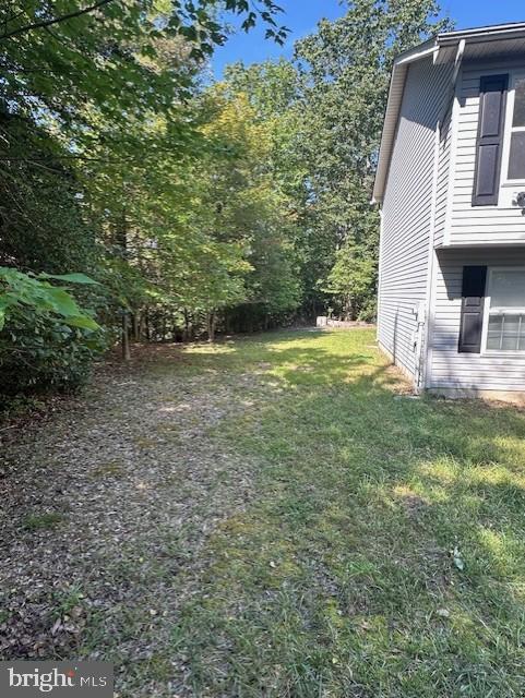 12627 Hilltop Road Lusby, MD 20657 - Photo 4 of 4 Left side yard space.