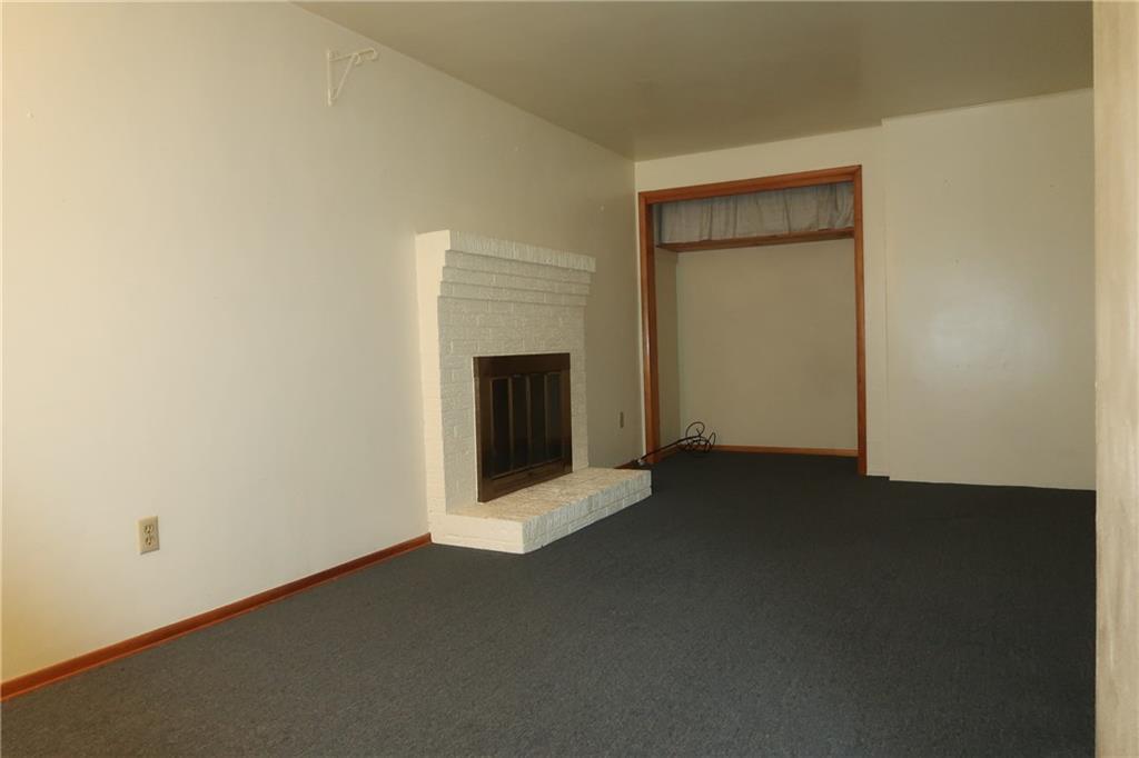 12859 Pine Hollow Road Trafford, PA 15085 - Photo 7 of 25 Wood burning Brick Fireplace, Large Storage Closet/Nook