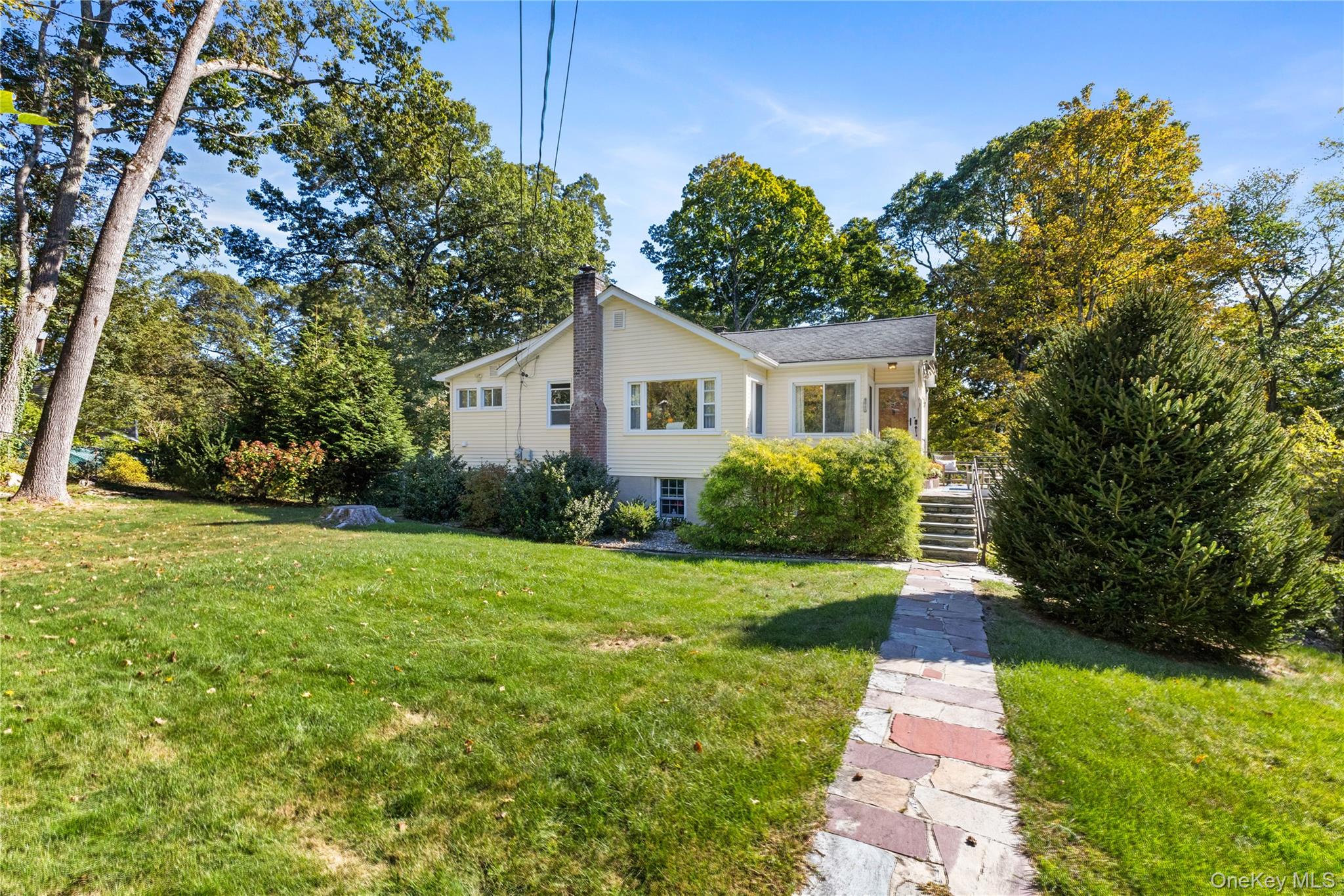 1645 Amazon Road, Unit 1645 Mohegan Lake, NY 10547 - Photo 1 of 50 a front view of a house with a yard