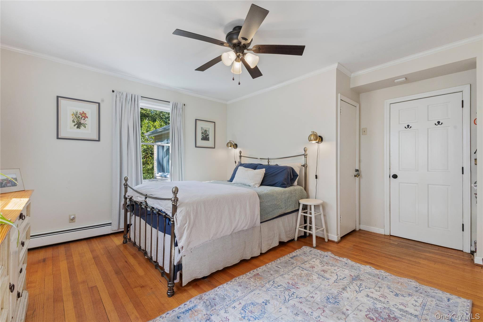 1645 Amazon Road, Unit 1645 Mohegan Lake, NY 10547 - Photo 14 of 50 a bedroom with a bed and a ceiling fan