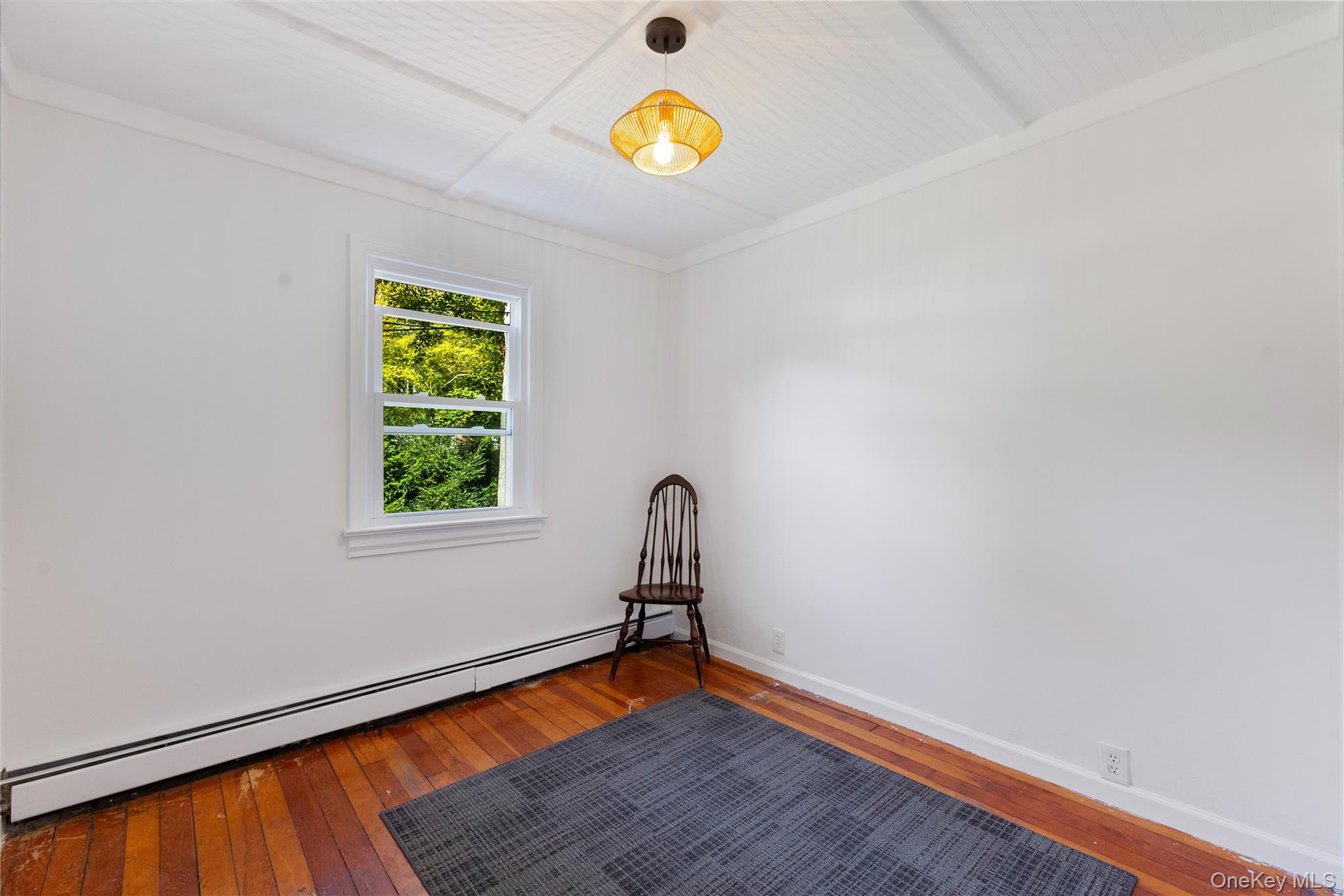 1645 Amazon Road, Unit 1645 Mohegan Lake, NY 10547 - Photo 20 of 50 a room with a window and wooden floor