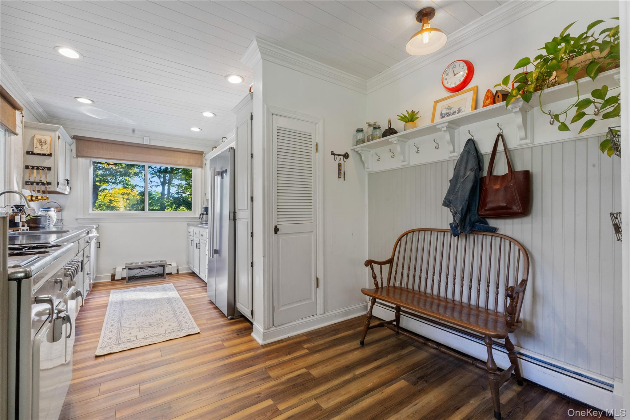 1645 Amazon Road, Unit 1645 Mohegan Lake, NY 10547 - Photo 28 of 50 a view of a hallway with a couch and a window