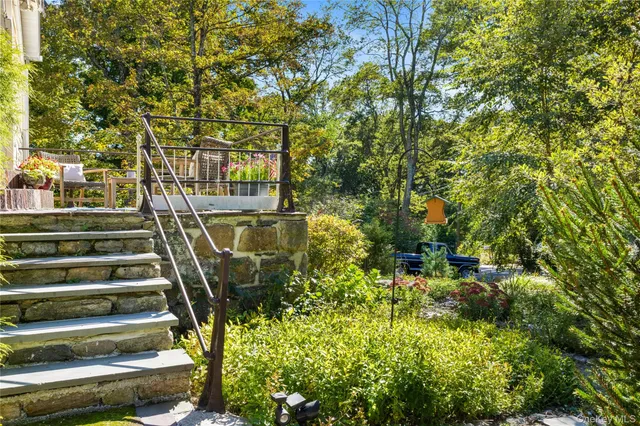 a view of statue in a garden