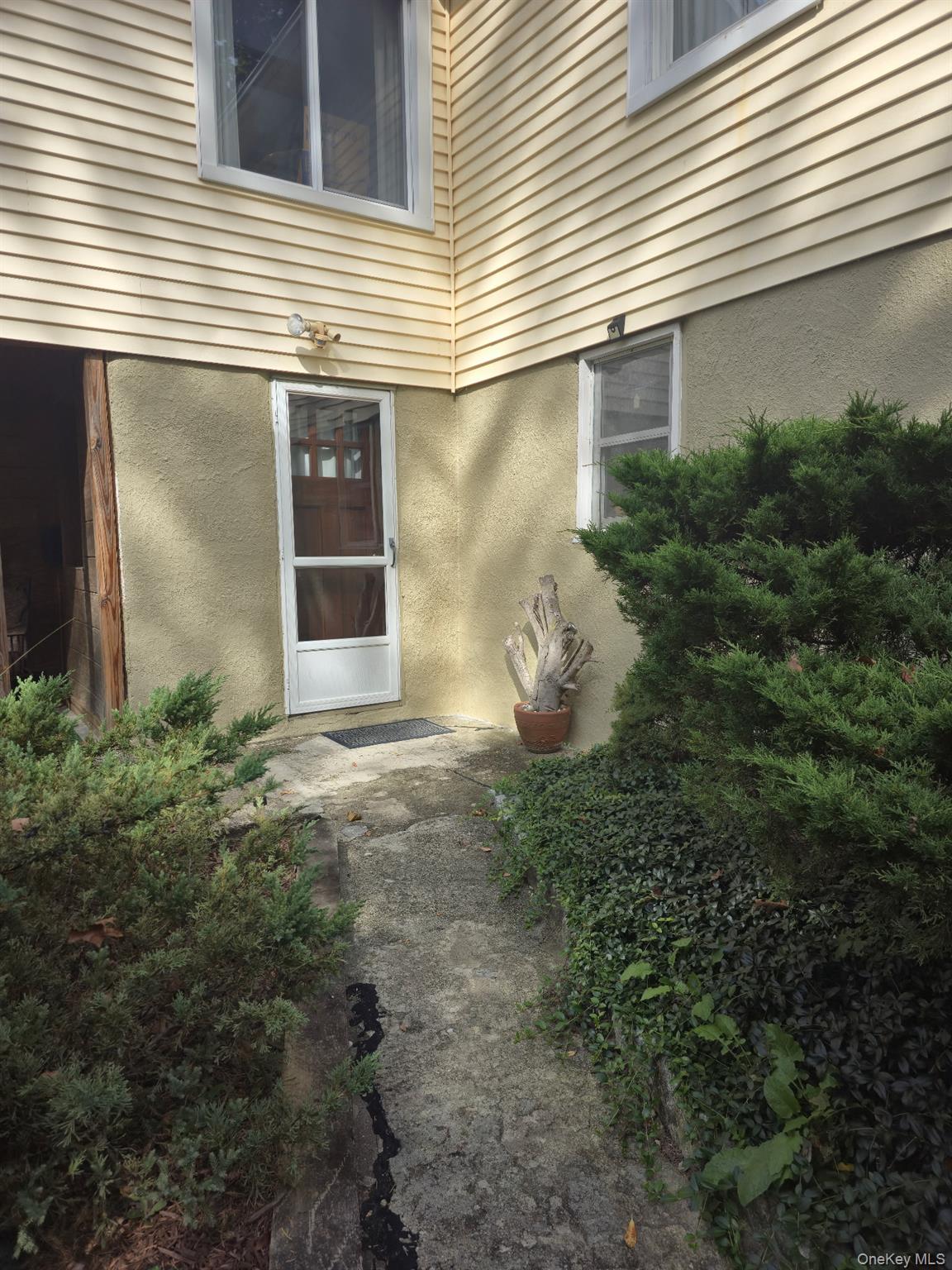 1645 Amazon Road, Unit 1645 Mohegan Lake, NY 10547 - Photo 43 of 50 a view of a house with a yard