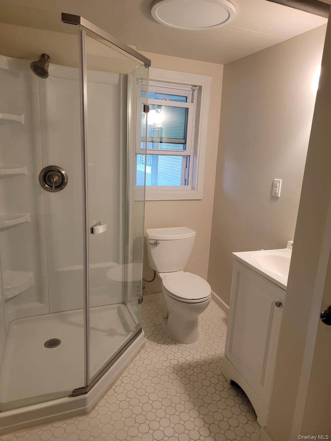 1645 Amazon Road, Unit 1645 Mohegan Lake, NY 10547 - Photo 45 of 50 a bathroom with a toilet and a shower