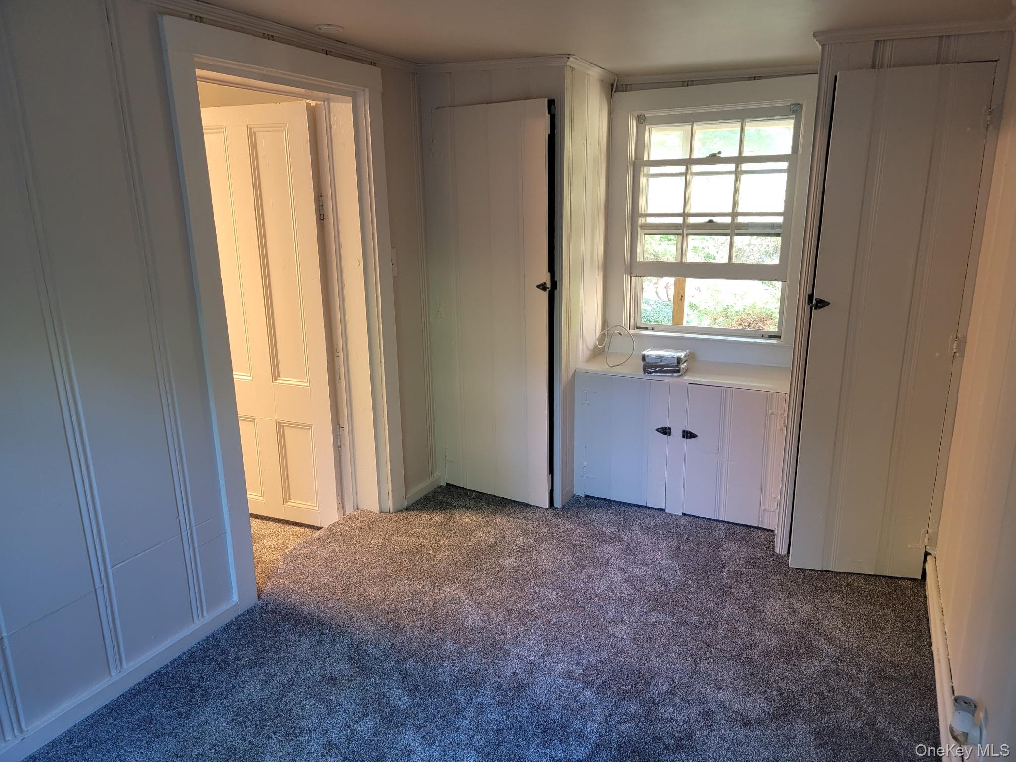 1645 Amazon Road, Unit 1645 Mohegan Lake, NY 10547 - Photo 47 of 50 an empty room with windows and closet